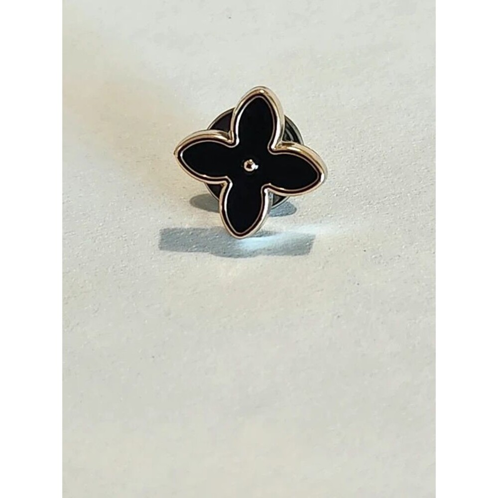 Mini black enamel flower pin